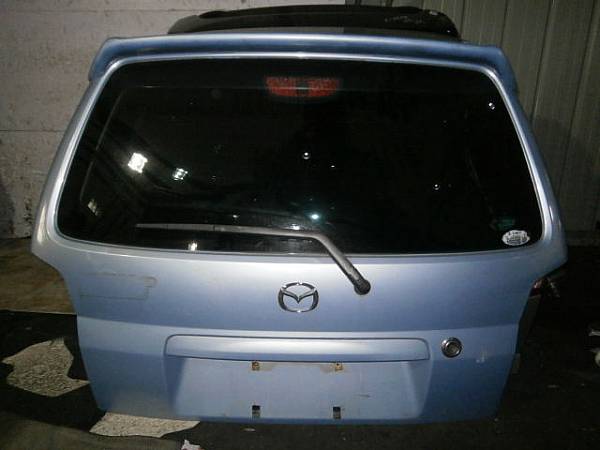 Задняя дверь мазда 3. Мазда Демио крышка багажника dw3w. Дверь багажника Mazda Demio dw3w. Mazda Demio крышка багажника. 5 Дверь Мазда Демио dw3w.